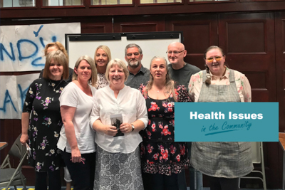 Group of adult learners in a community setting