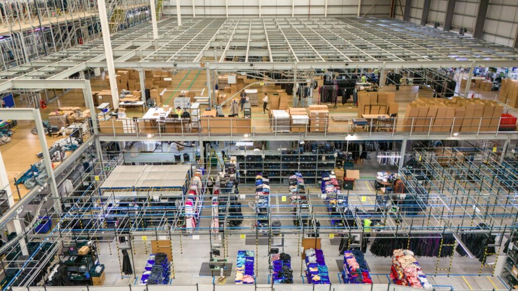 ACS Clothing factory interior showing the returns area and lots of cardboard boxes