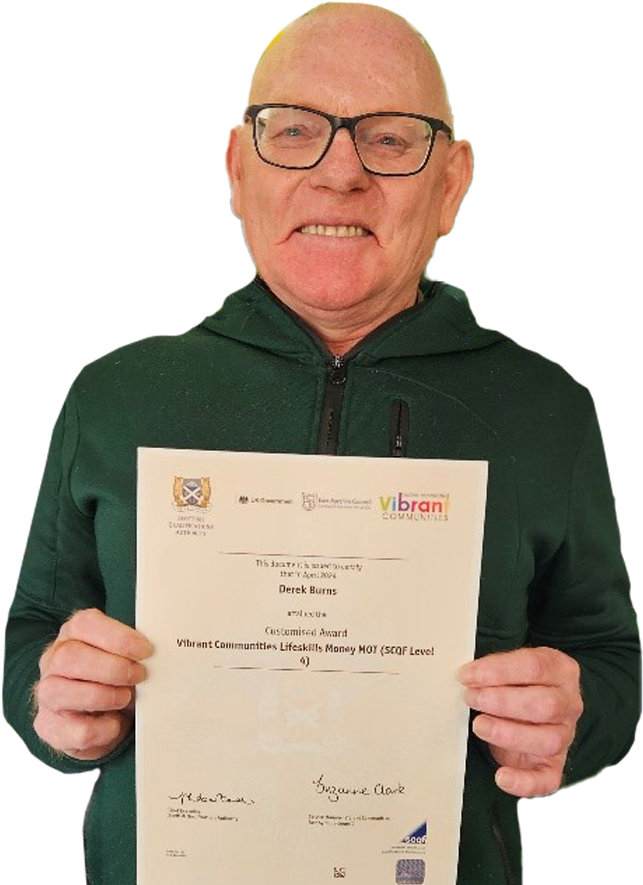 A learner with a certificate, showing that he has achieved a qualification at SCQF level 4. It's for a Money MOT course run by Vibrant Communities within East Ayrshire Council.
