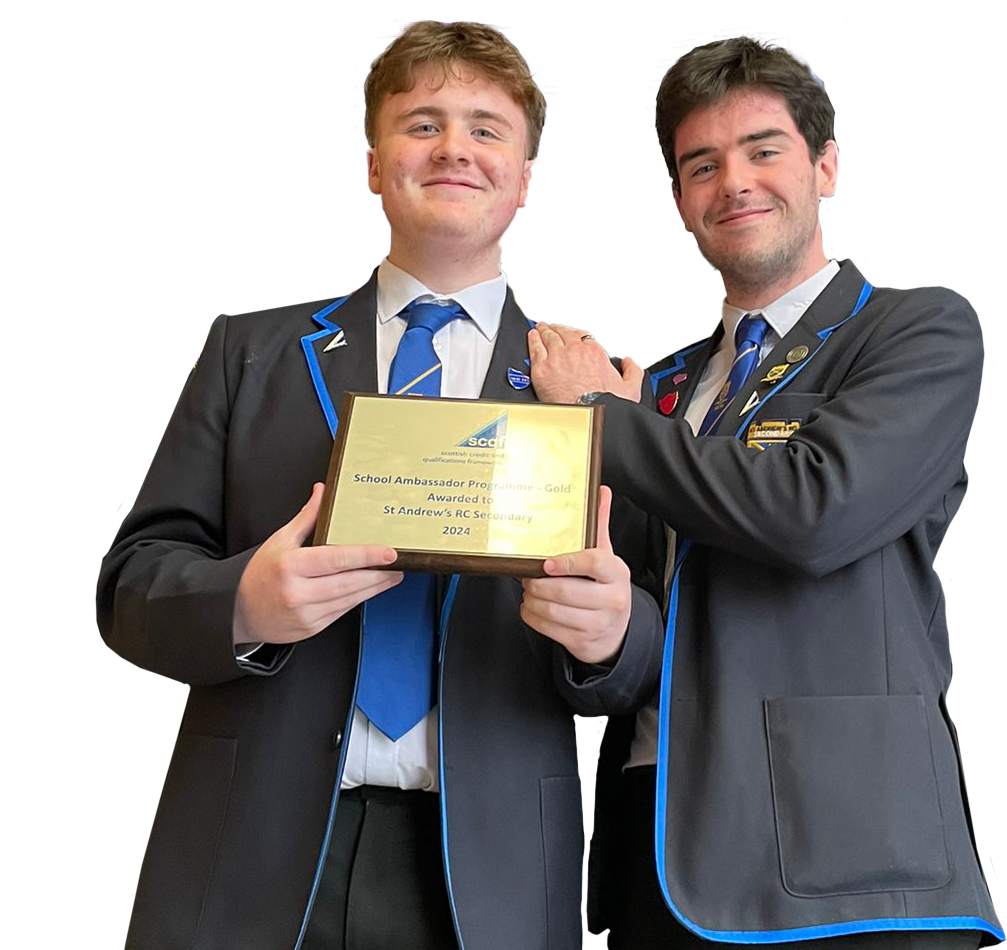 Two male students from St Andrew's Secondary School, in Glasgow, wearing their uniform. One student is leaning on the other and they're both smiling. The student on the left is holding up a gold SCQF School Ambassador plaque.