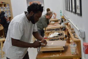 Man creating piece of furniture