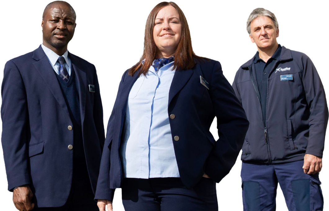 Three ScotRail employees standing, smiling. ScotRail is an SCQF Inclusive Recruiter