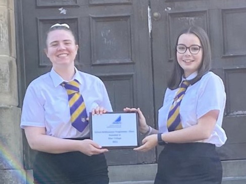 SCQF School Ambassadors hold up their silver plaque