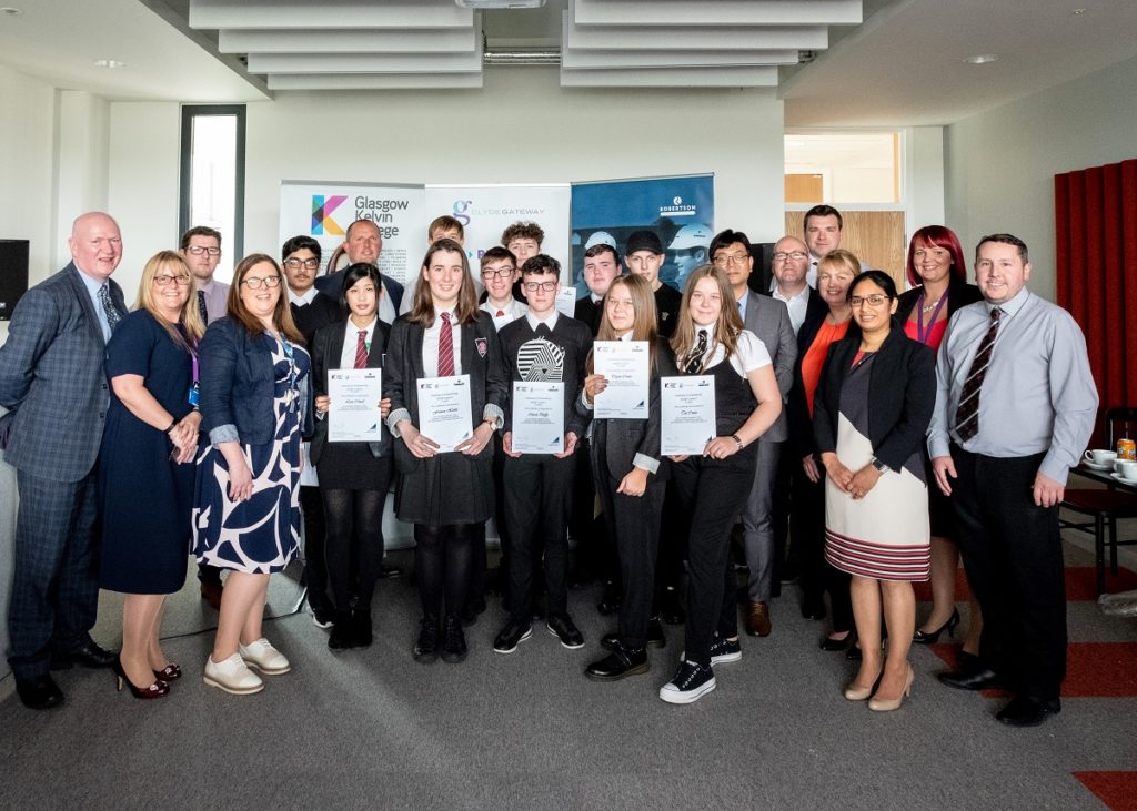 Gateway to Engineering pupils holding certificates in group with invited guests