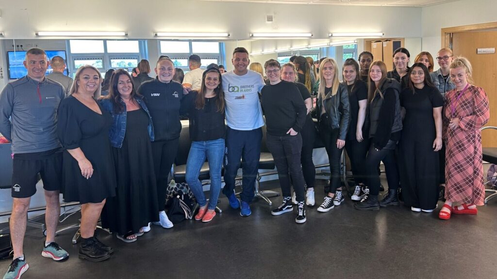 Brothers in Arms at Glasgow Clyde College, with students, celebrating the qualification being credit rated onto the SCQF