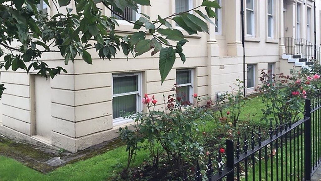 Outside shot of the Garnethill Centre - a sandstone, building. The centre is in the basement.